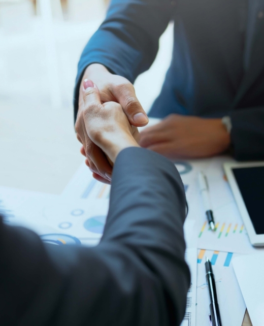 Work With Us - Man and a woman shaking hands